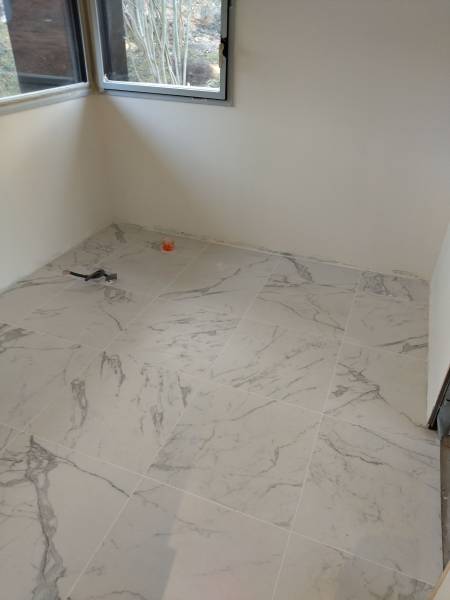 Entreprise pour la pose de carrelage mural grand format dans une salle de bain proche Yvetot 76