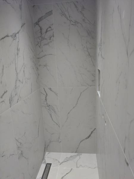 Entreprise pour la pose de carrelage mural grand format dans une salle de bain proche Yvetot 76