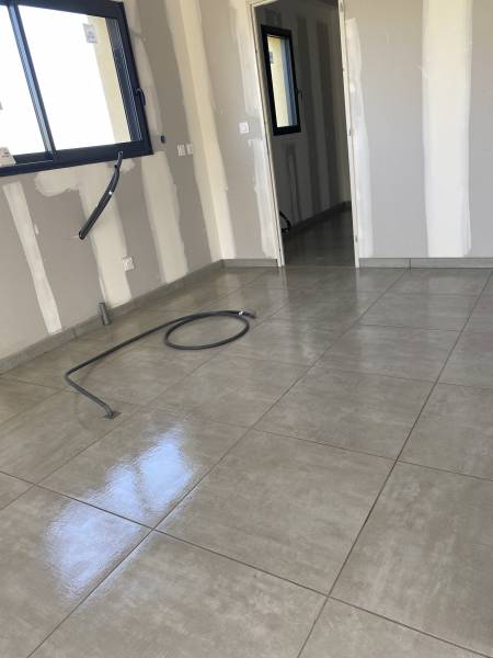 Pose de carrelage format 60x60 sol dans un pavillon neuf à proximité d' YVETOT 76