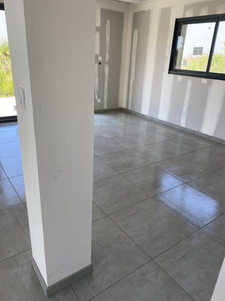 Pose de carrelage format 60x60 sol dans un pavillon neuf à proximité d' YVETOT 76