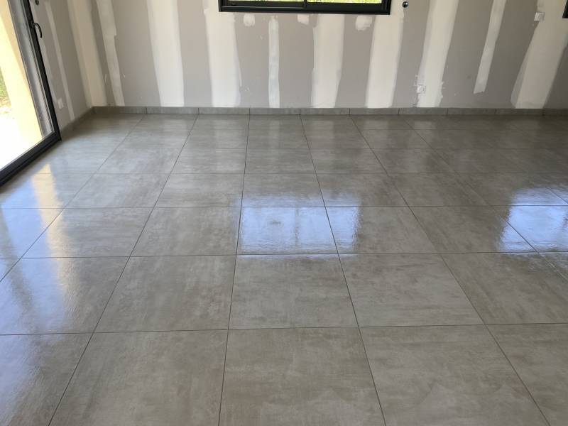 Pose de carrelage format 60x60 sol dans un pavillon neuf à proximité d' YVETOT 76