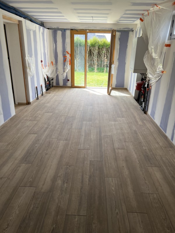 Réalisation sur devis d'une pose d'isolant TMS de 100 mm et d'un carrelage imitation bois secteur Dieppe 76