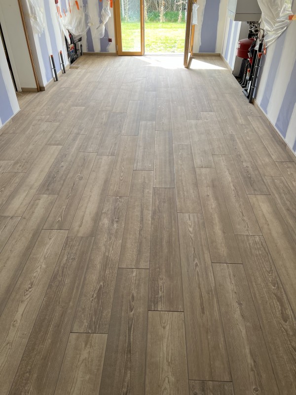 Réalisation sur devis d'une pose d'isolant TMS de 100 mm et d'un carrelage imitation bois secteur Dieppe 76